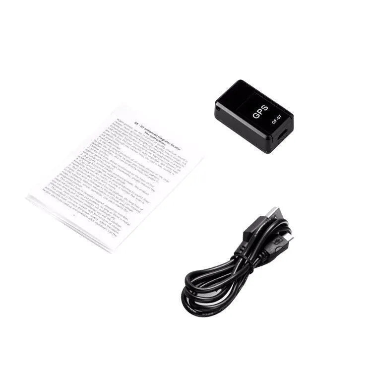 Black mini magnetic GPS car tracker device showing compact size and USB charging cable