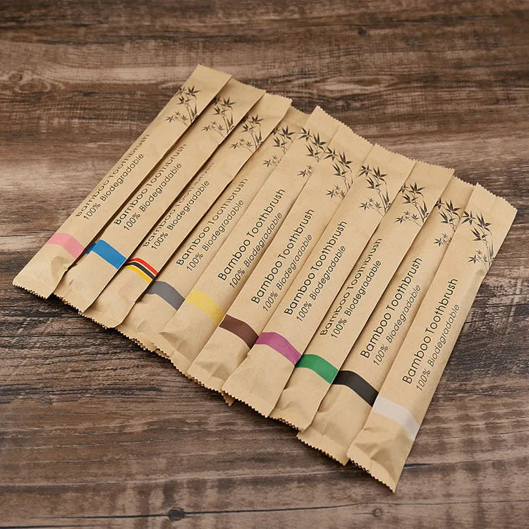 Set of 10 bamboo toothbrushes with charcoal-infused soft bristles in multiple colours