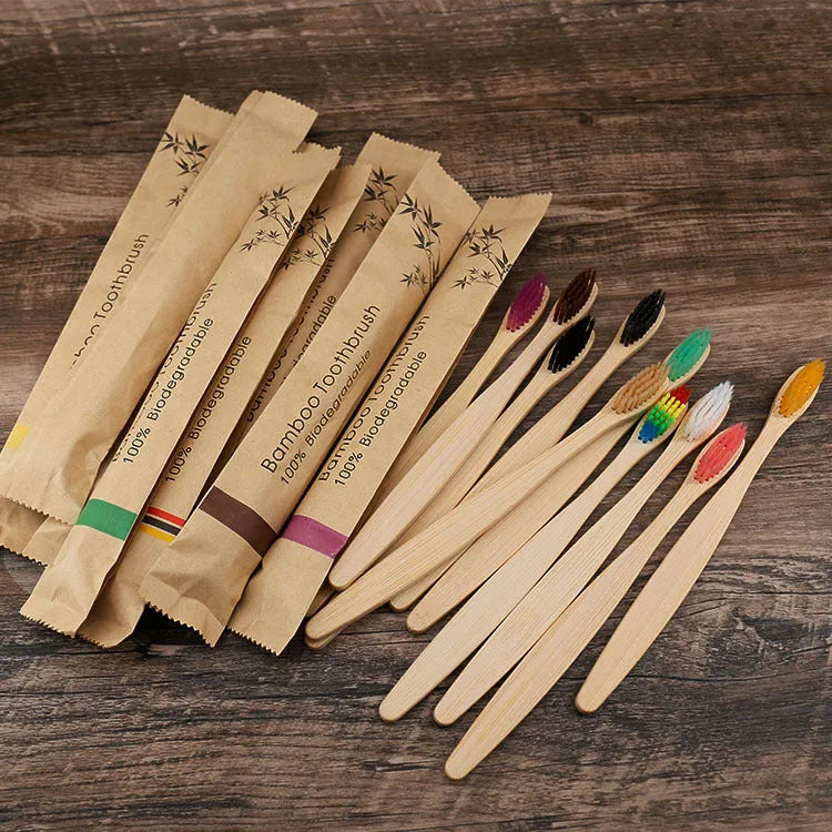 Set of 10 bamboo toothbrushes with charcoal-infused soft bristles in multiple colours