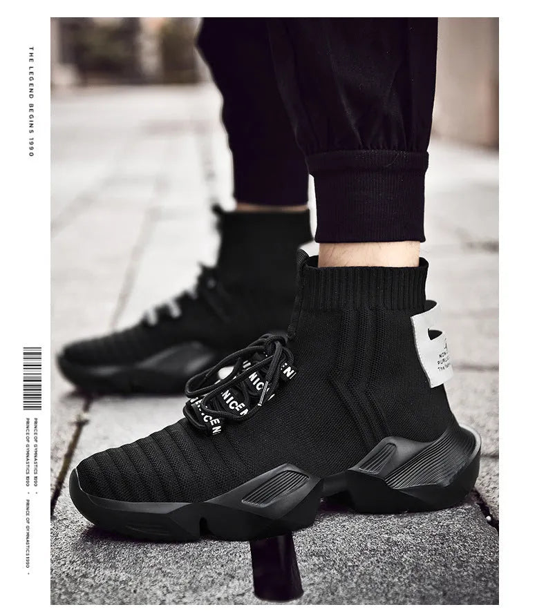 Men's black and white casual sports shoes with mesh lining, shown in larger sizes.