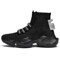 Men's black and white casual sports shoes with mesh lining, shown in larger sizes.