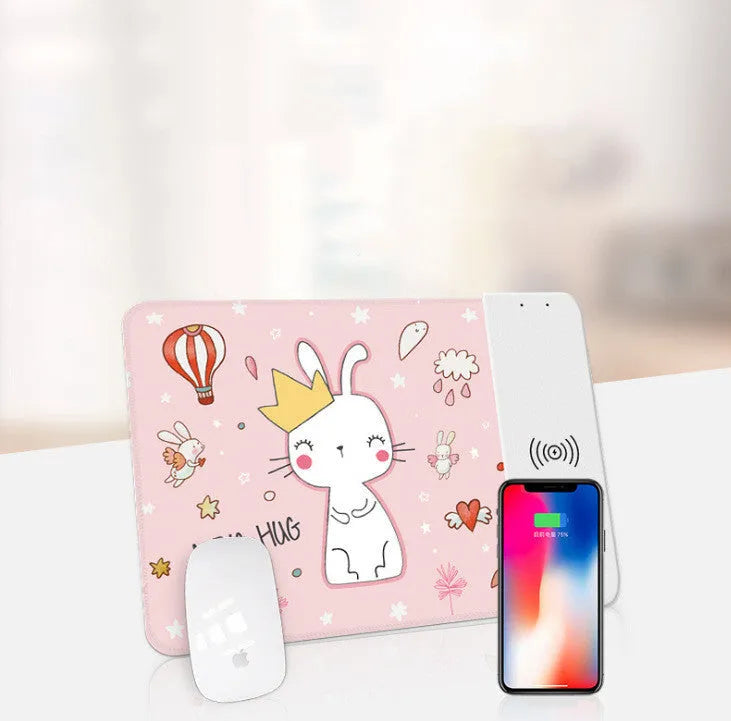 Wireless charging mouse pad with cartoon design and RGB lighting on desk