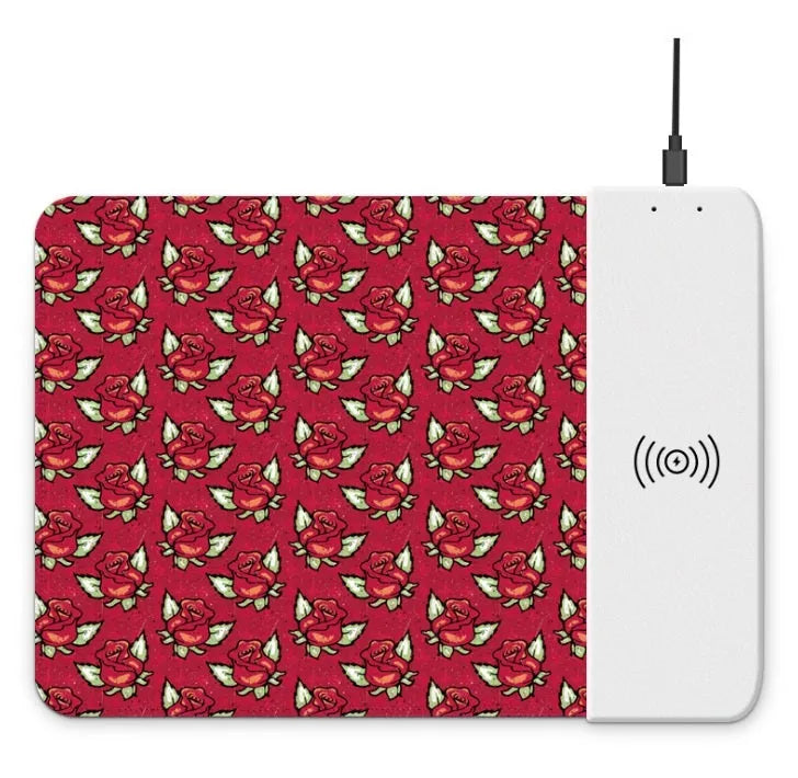 Wireless charging mouse pad with cartoon design and RGB lighting on desk