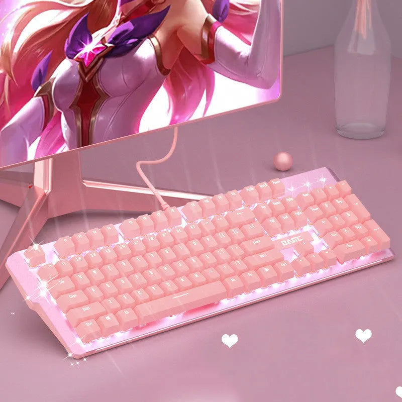 Pink mechanical gaming keyboard and wired mouse set with USB cables on gaming desk