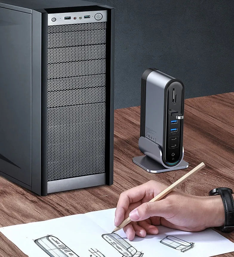 Deep space grey 16-in-1 Type-C docking station hub with external power supply on a desk
