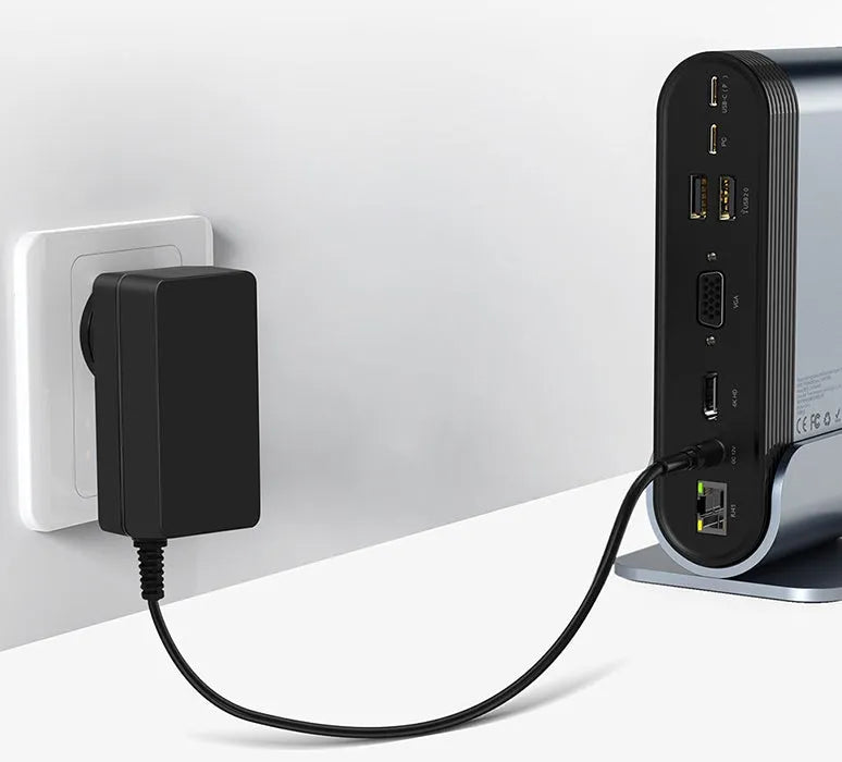 Deep space grey 16-in-1 Type-C docking station hub with external power supply on a desk