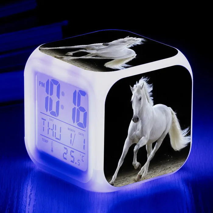 Square cartoon-style alarm clock with LED display showing time and temperature