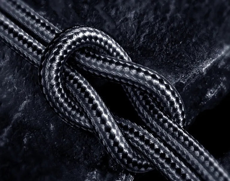 Black magnetic USB charging cable with rotating head and blue LED light on a 1m nylon braid.