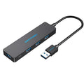 Black four-port USB 3.0 hub with a short cable and nickel-plated ports