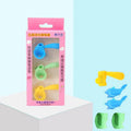 Children's writing orthosis set with pen holders and ergonomic grip corrector in mixed colours