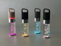 Portable Bluetooth speaker with colourful crystal light in pink, black, silver gray, or green colours