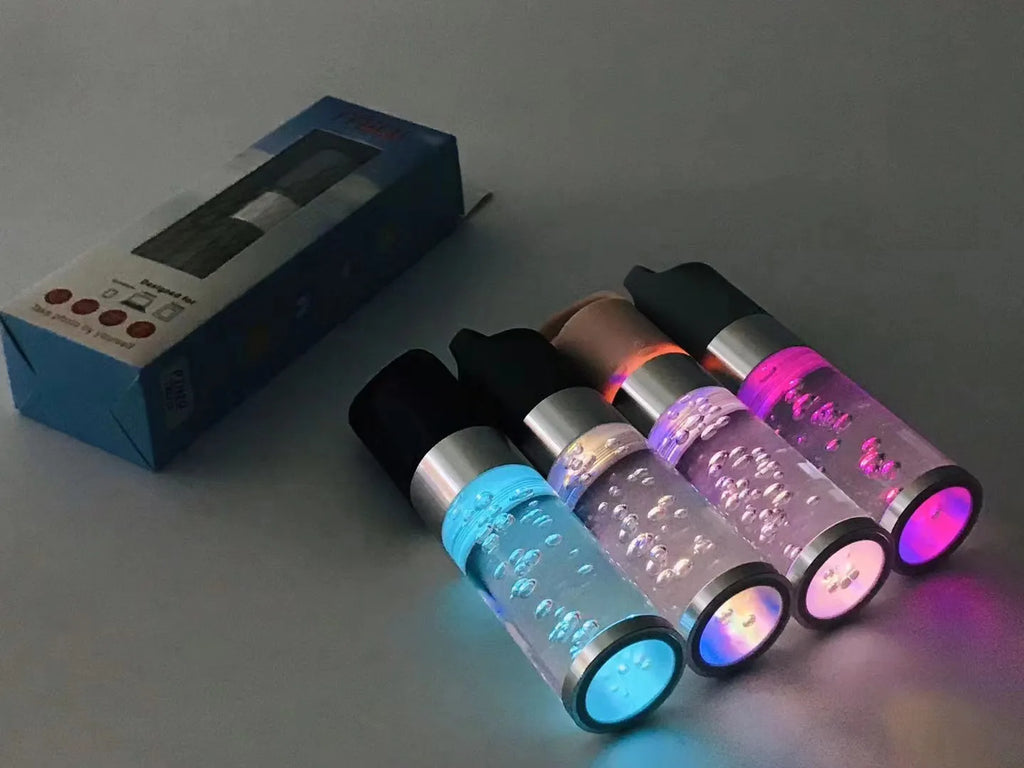 Portable Bluetooth speaker with colourful crystal light in pink, black, silver gray, or green colours