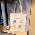 Women's canvas tote shopper bag with geometric pattern and zipper closure in light pink colour