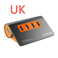 Dark grey aluminium USB hub with orange detailing showing four USB 3.1 ports and detachable cable