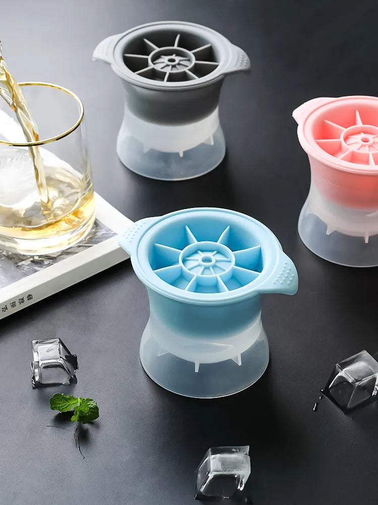 Silicone ice tray producing large hockey-shaped ice cubes in light grey colour