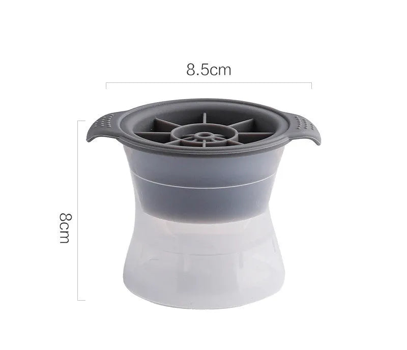 Silicone ice tray producing large hockey-shaped ice cubes in light grey colour