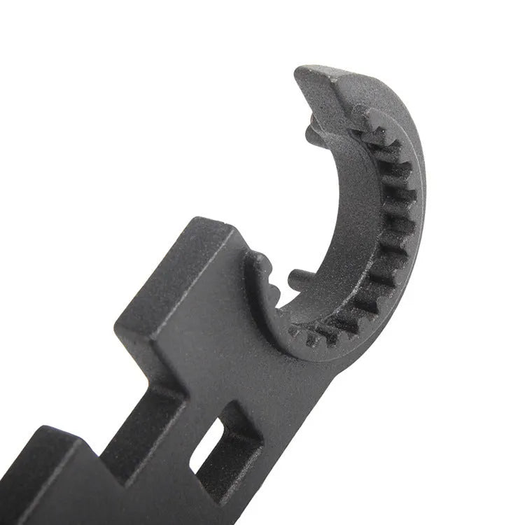 Black steel combination wrench for AR15 and M4 rifle maintenance with dual-purpose design