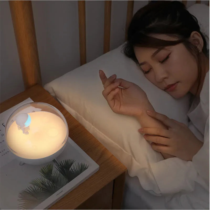 USB-powered cartoon night light with regular and sleep aid versions in white and blue colours