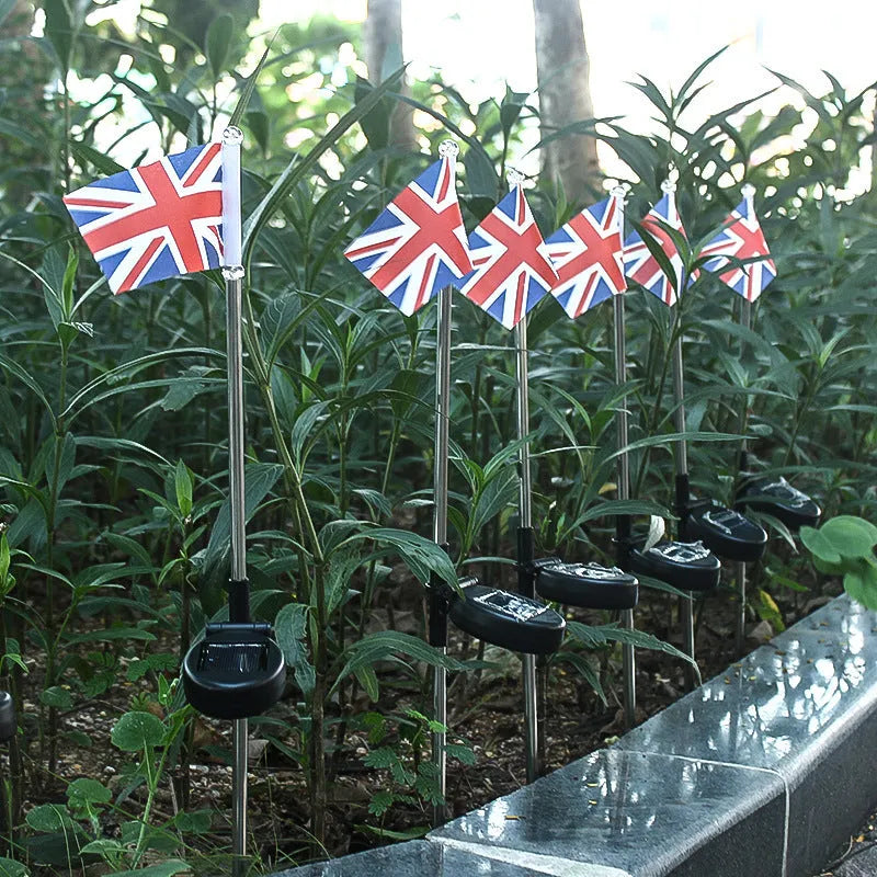 Solar garden flag light showing American or British flag design with stainless steel and plastic construction.