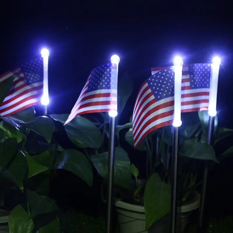 Solar garden flag light showing American or British flag design with stainless steel and plastic construction.