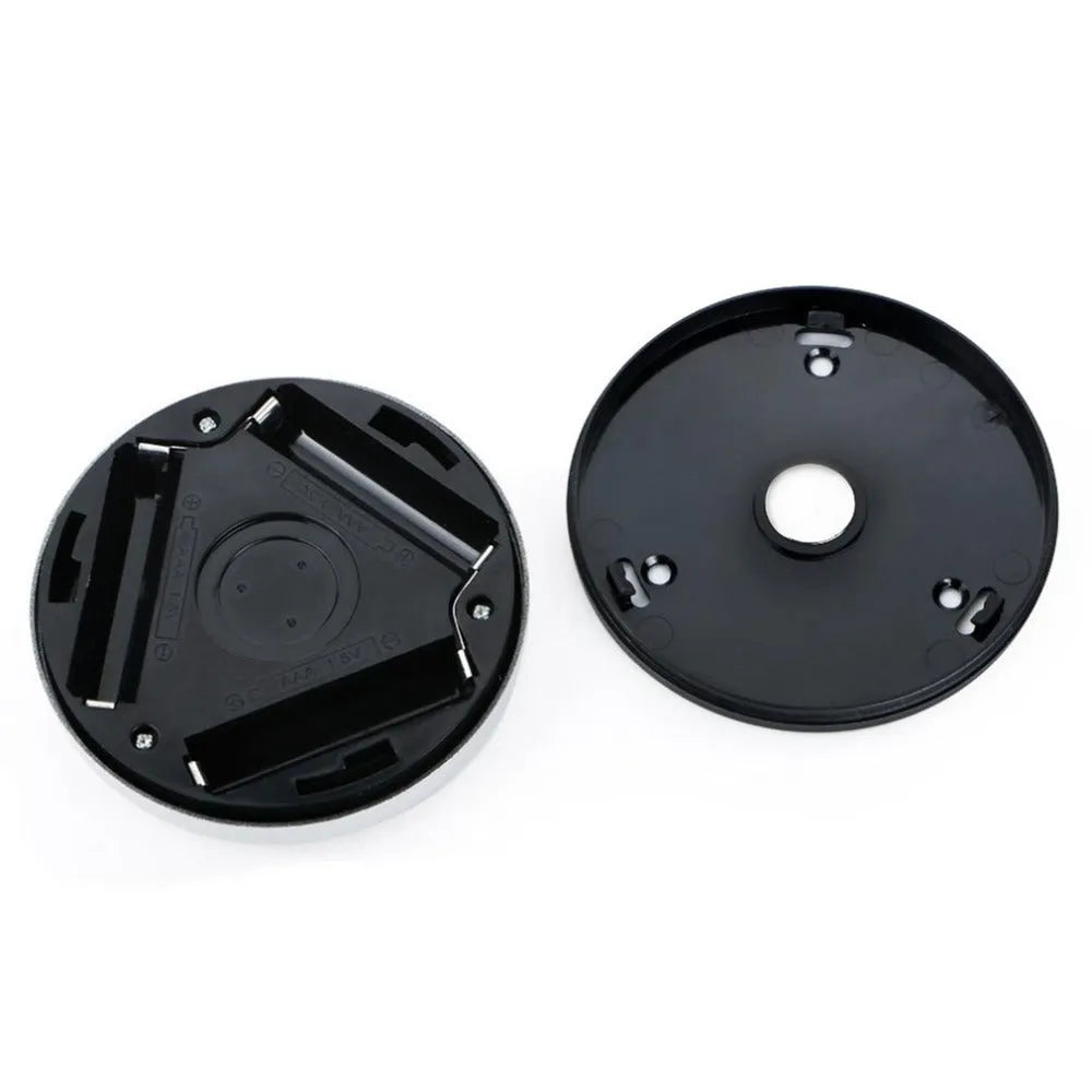 Round silver wireless motion sensor night light with battery operation for automatic LED illumination