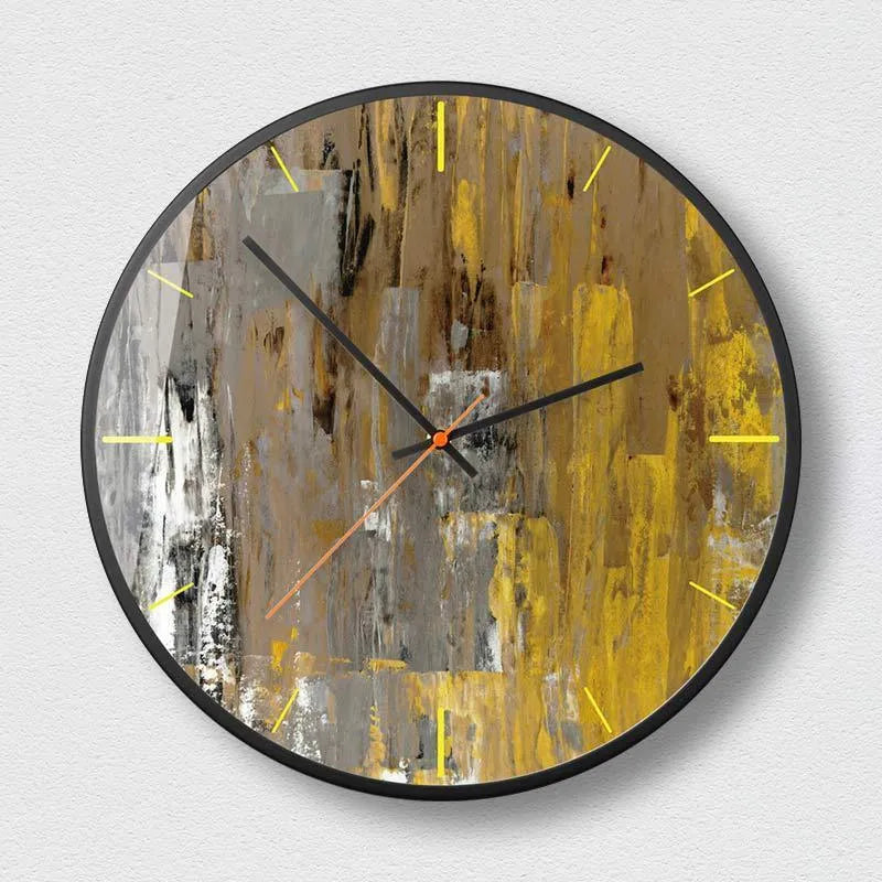 Round abstract art design wall clock with metal case on a wall.