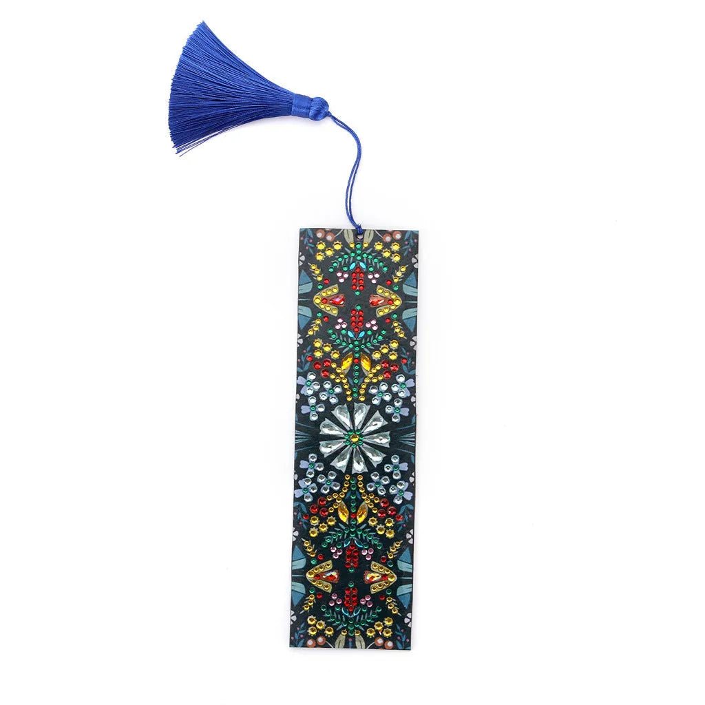 Close-up of a leather bookmark with a hand-embroidered mandala flower design in special-shaped diamond rhinestones.