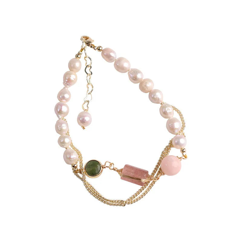 Women's pink freshwater pearl bracelet with strawberry crystal accents in geometric design