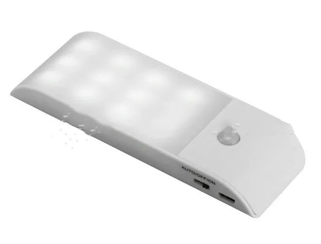 White rechargeable LED night light with infrared motion sensor on a wall.