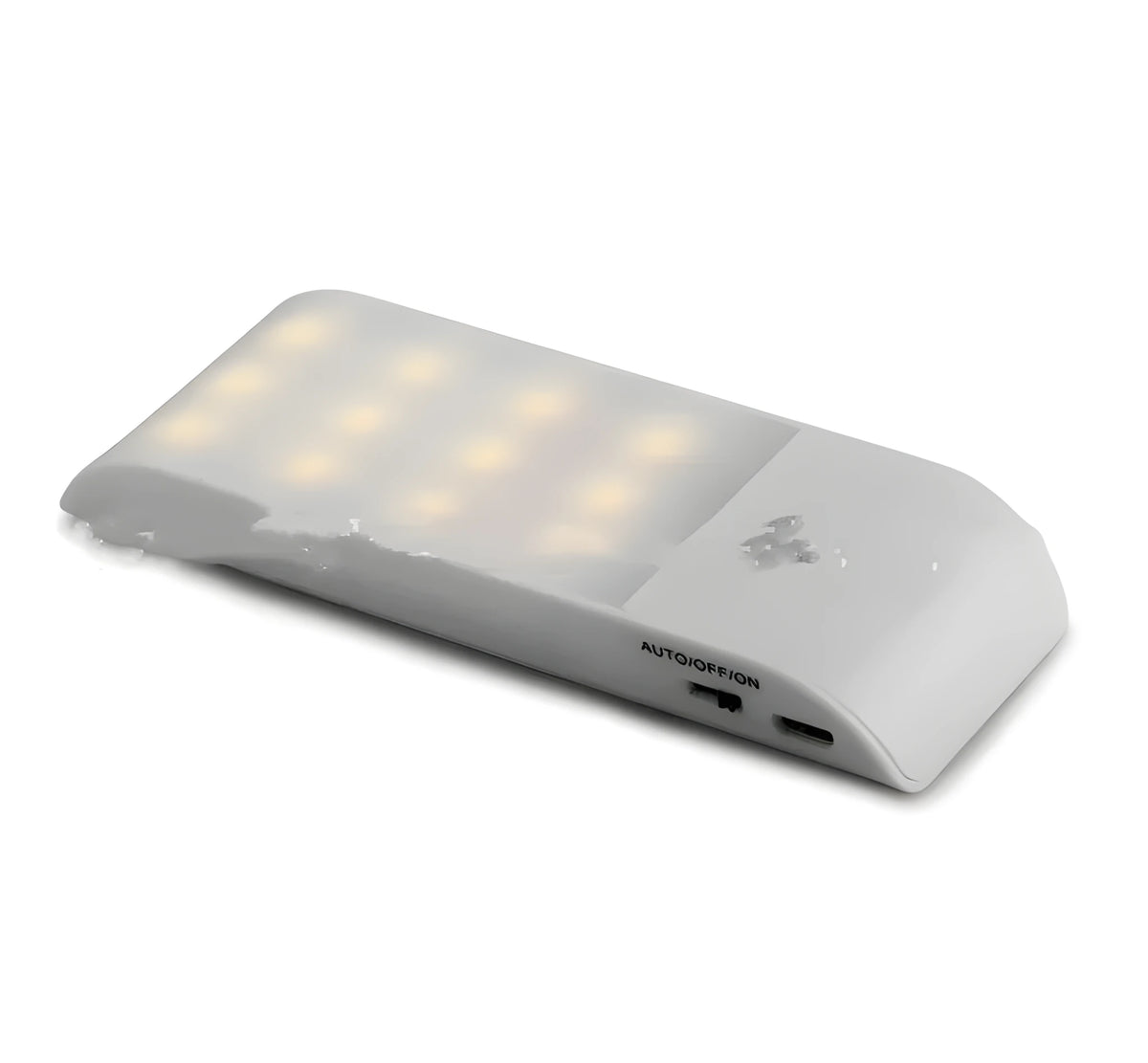 White rechargeable LED night light with infrared motion sensor on a wall.