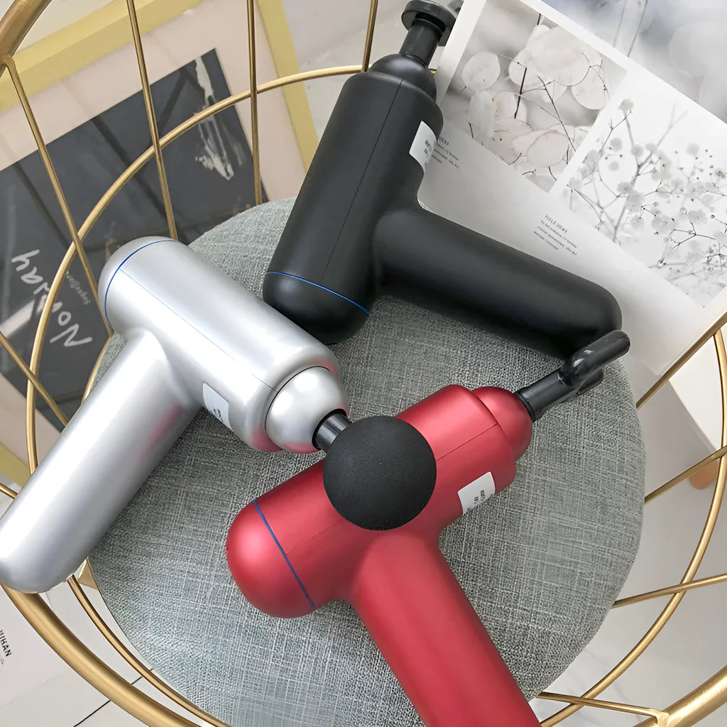 God Fascia Gun muscle massager in black, red or white with three attachment heads