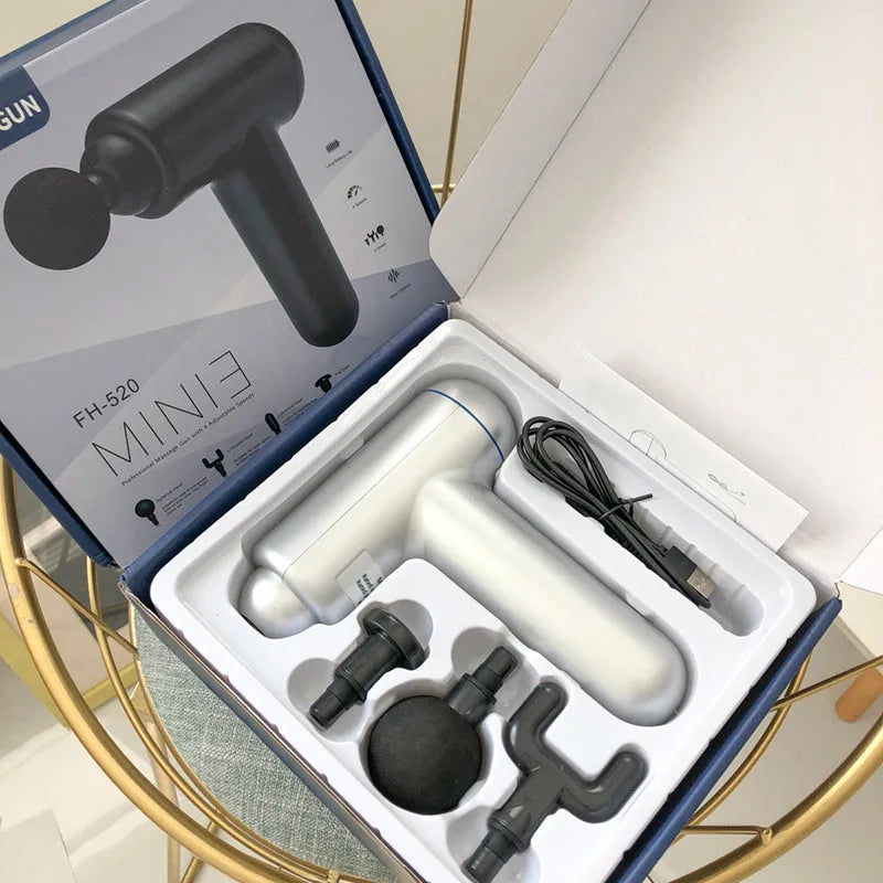 God Fascia Gun muscle massager in black, red or white with three attachment heads