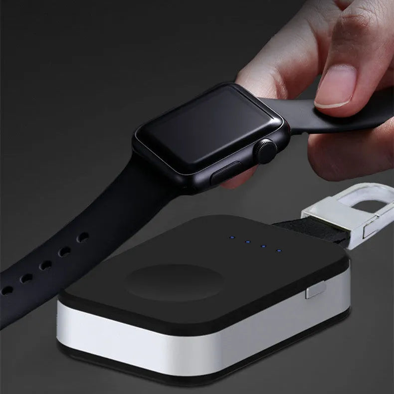 Black Apple Watch wireless charging power bank with keychain attachment for portable use