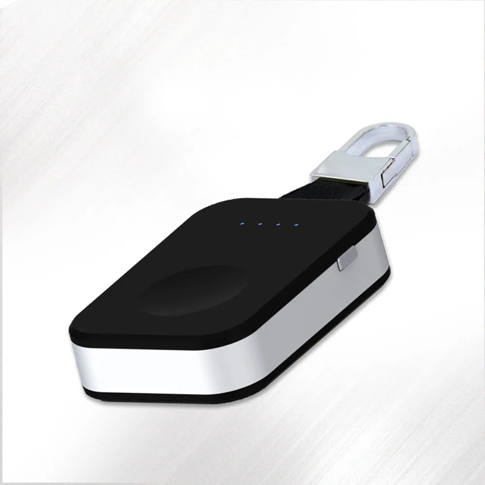 Black Apple Watch wireless charging power bank with keychain attachment for portable use
