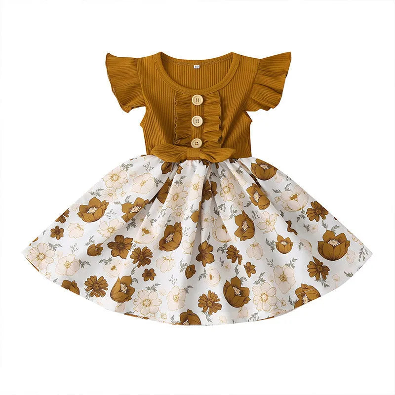 Sleeveless summer dress for toddler girl in yellow on a hanger