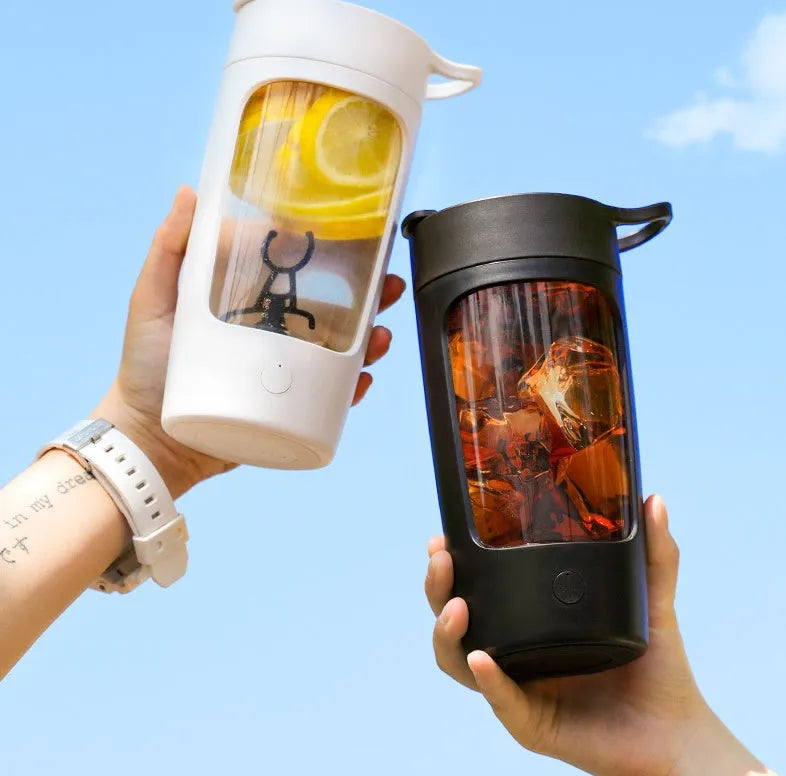 Portable USB rechargeable juice blender in black, blue, pink, or white with 650ml cup and compact design.