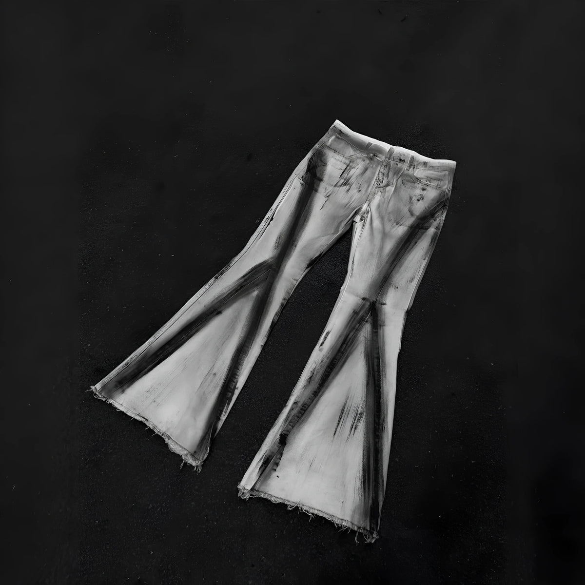 White heavy rough selvedge denim jeans with a black ribbon gradient detail on the leg.