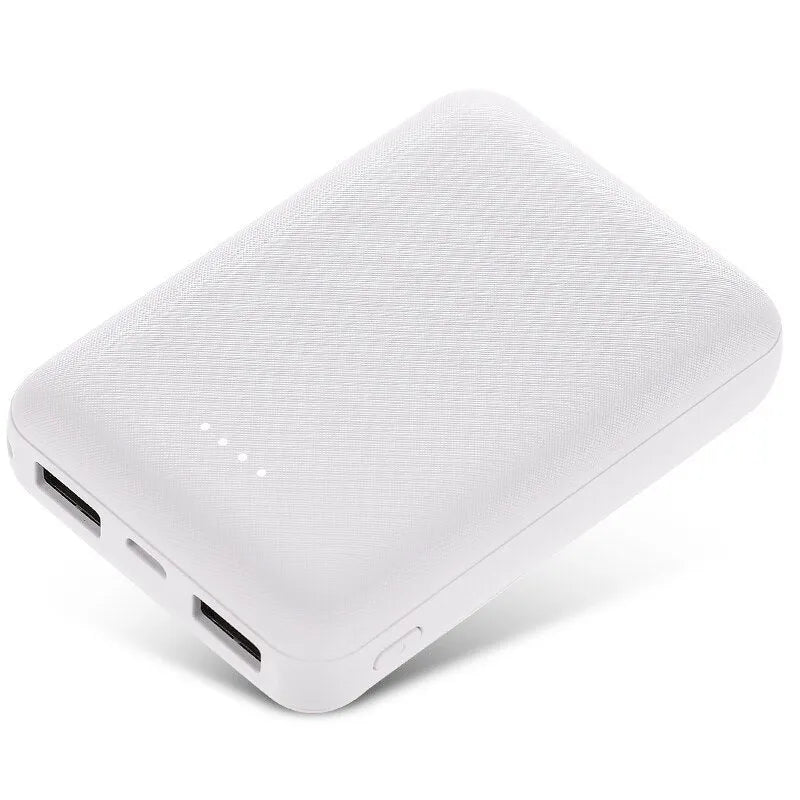 Black ultra-thin 10,000mAh power bank with multiple USB ports on a white background