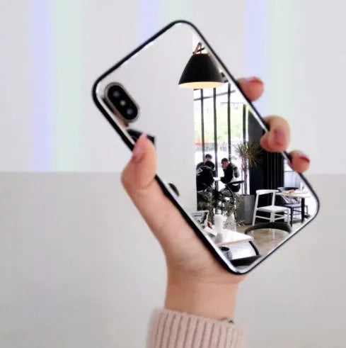 Black iPhone mirror phone case with integrated make-up mirror on back, compatible with iPhone 7 Plus, 8 Plus and X models
