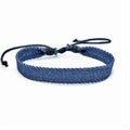 National style denim fabric unisex bracelet carrying strap laid flat.
