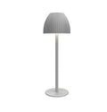 Ins pattern dimming small night lamp in thin round base black or white on a table.
