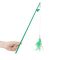 Green interactive cat feather wand toy with bell and feather attachments for indoor play