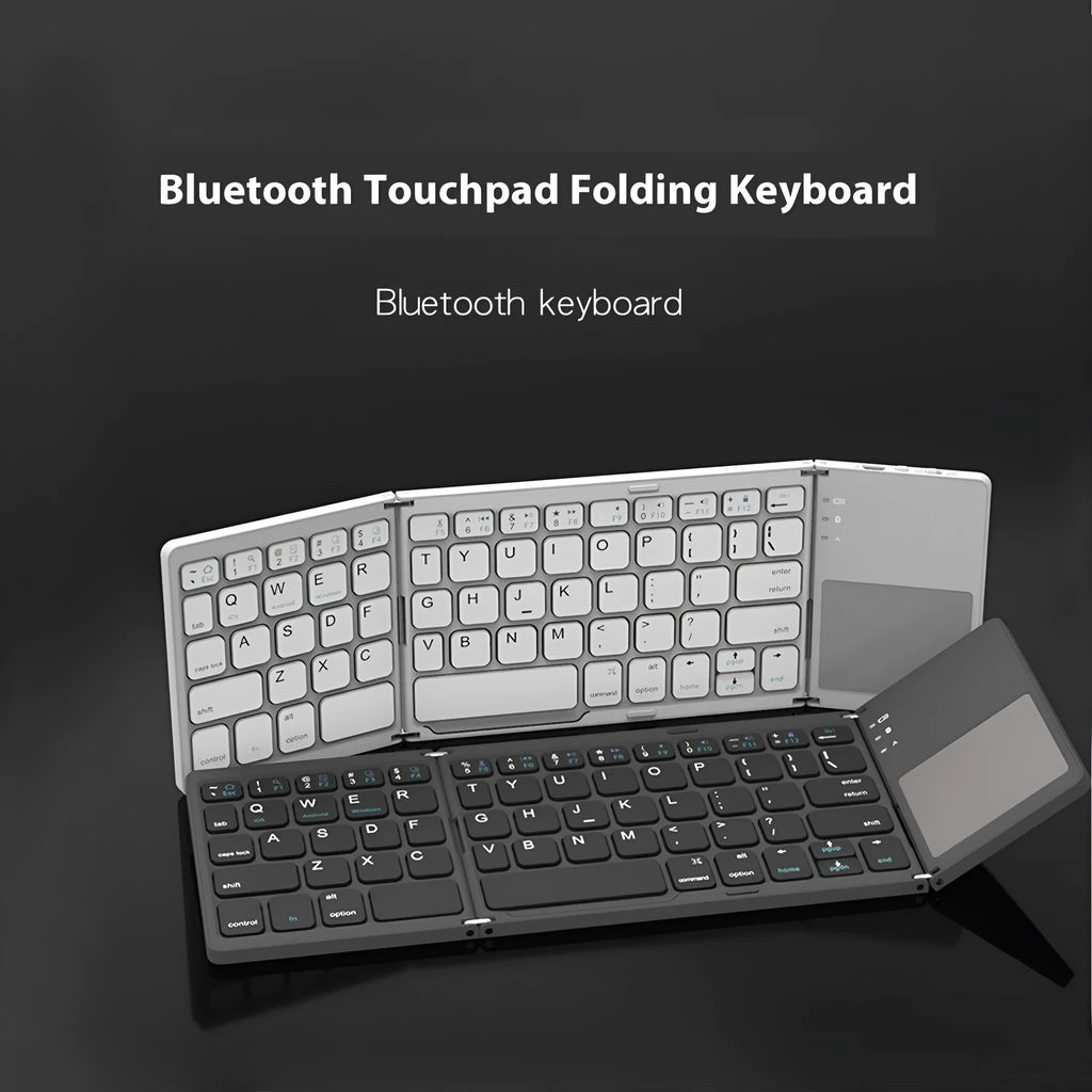 Black tri-fold Bluetooth keyboard shown unfolded next to smartphone demonstrating portable wireless typing