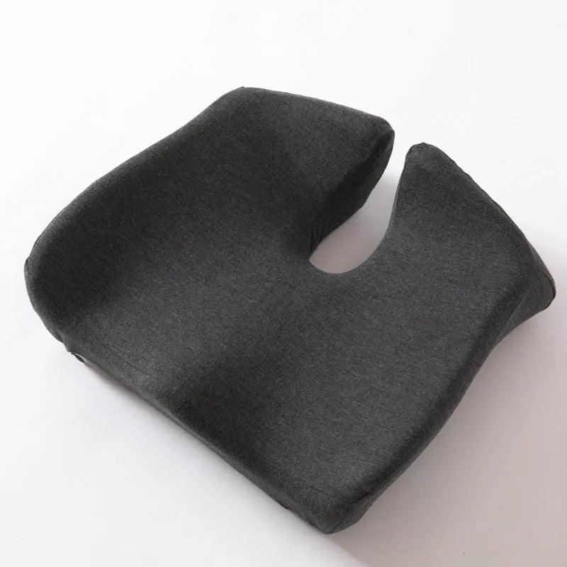 A dark grey memory foam office chair cushion measuring 36x40x11cm for lumbar support.