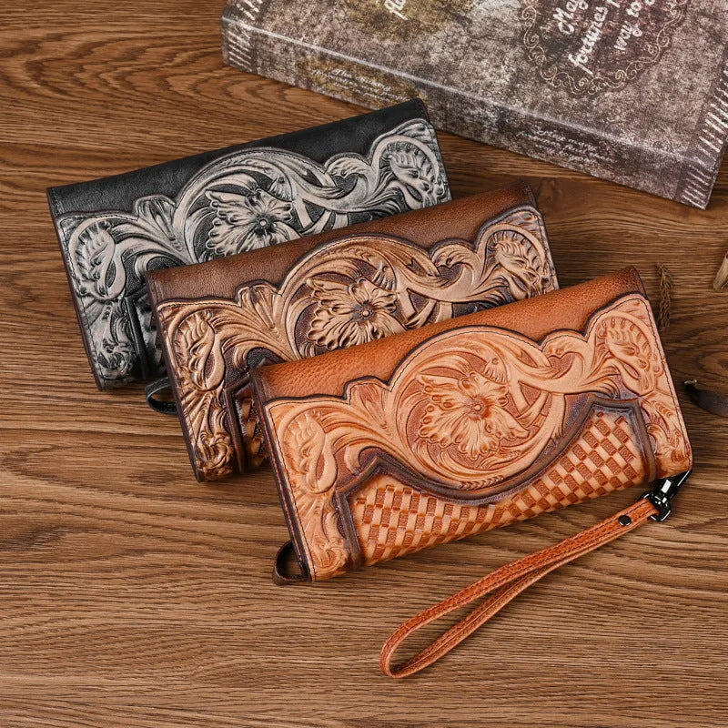 Women's brown embossed floral genuine leather tri-fold wallet showing interior compartments