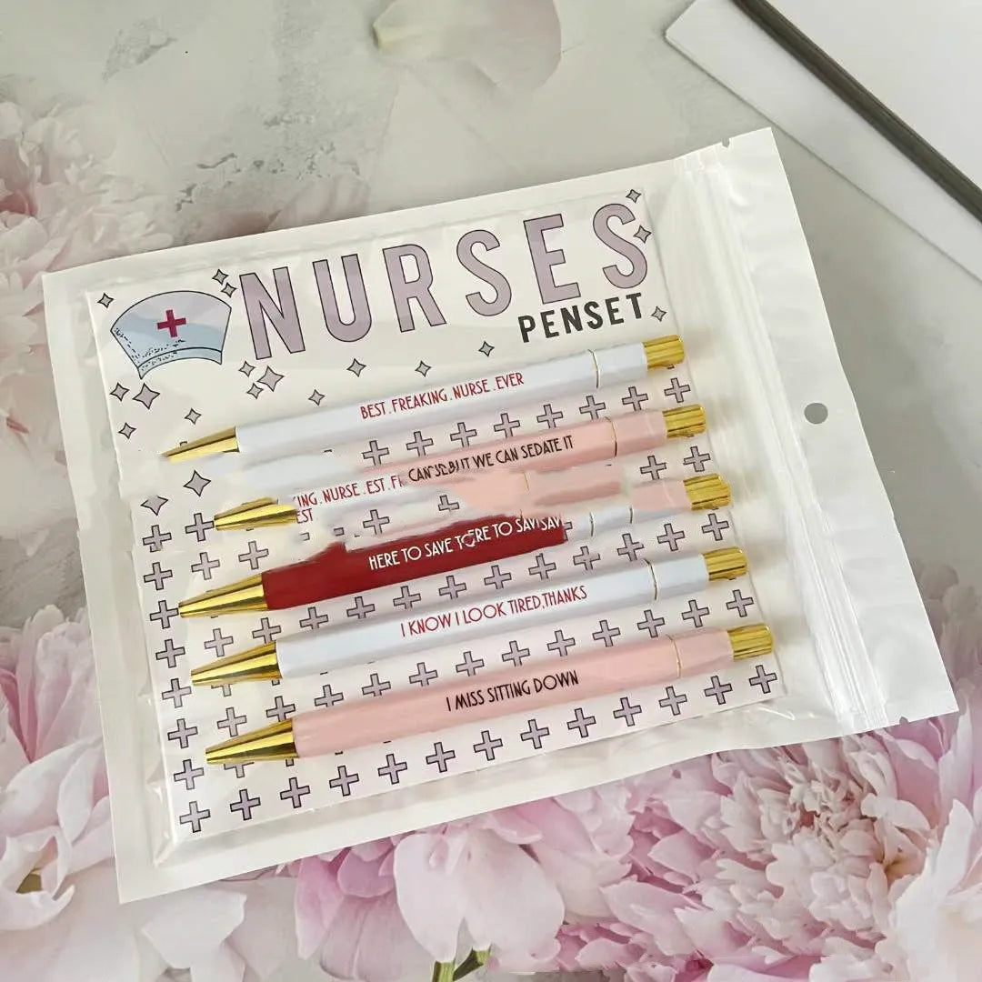 Five nurse-themed retractable ballpoint pens showing medical designs