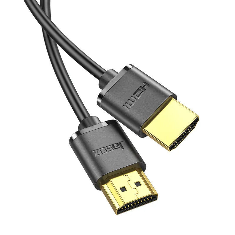 Flexible HDMI video cable with gold-plated connectors, shown in a hairline finish, suitable for computers and projectors.