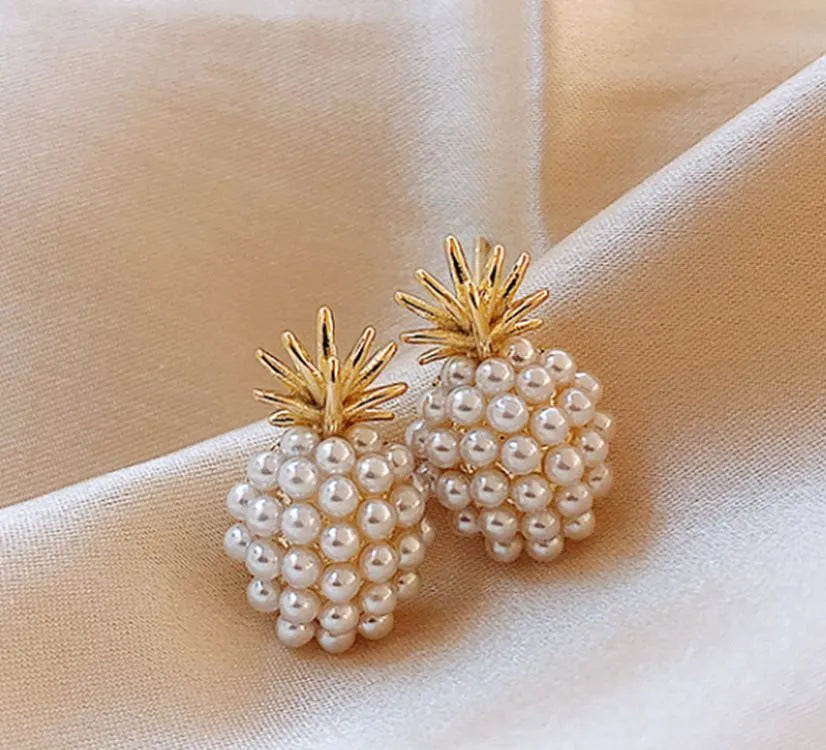 Korean style pineapple and starfish pearl design alloy earrings with electroplated gold, silver, pearl flower, and starfish pearl finishes.