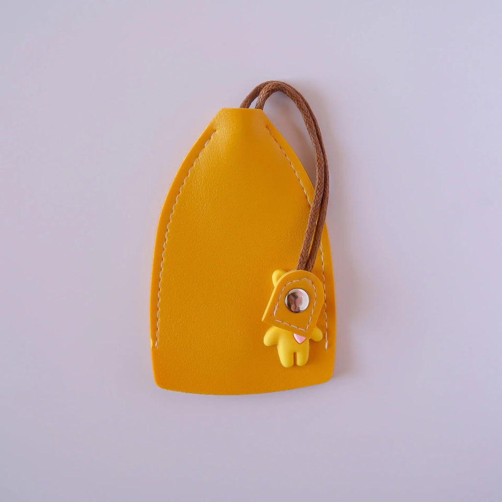PU leather car key case in five colours with credit card slot and large key compartment.
