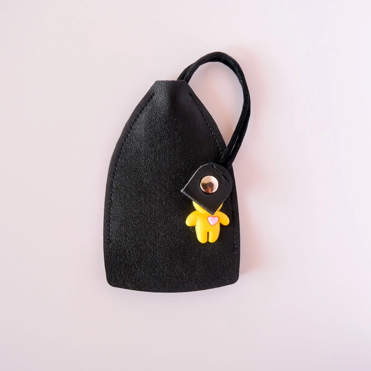 PU leather car key case in five colours with credit card slot and large key compartment.